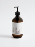 JGSS Hand & Body Wash Patchouli & Amber Vanilla bottle with luxury skincare design.