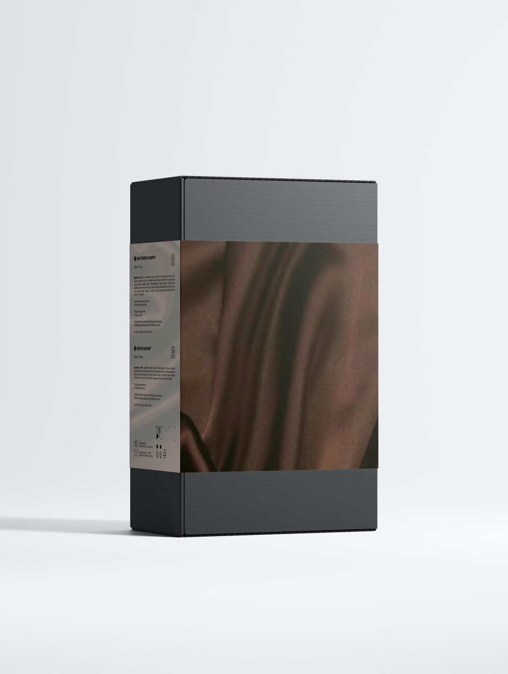 Luxury haircare duo in a sleek black box, designed to revive tired hair and boost volume and vitality.