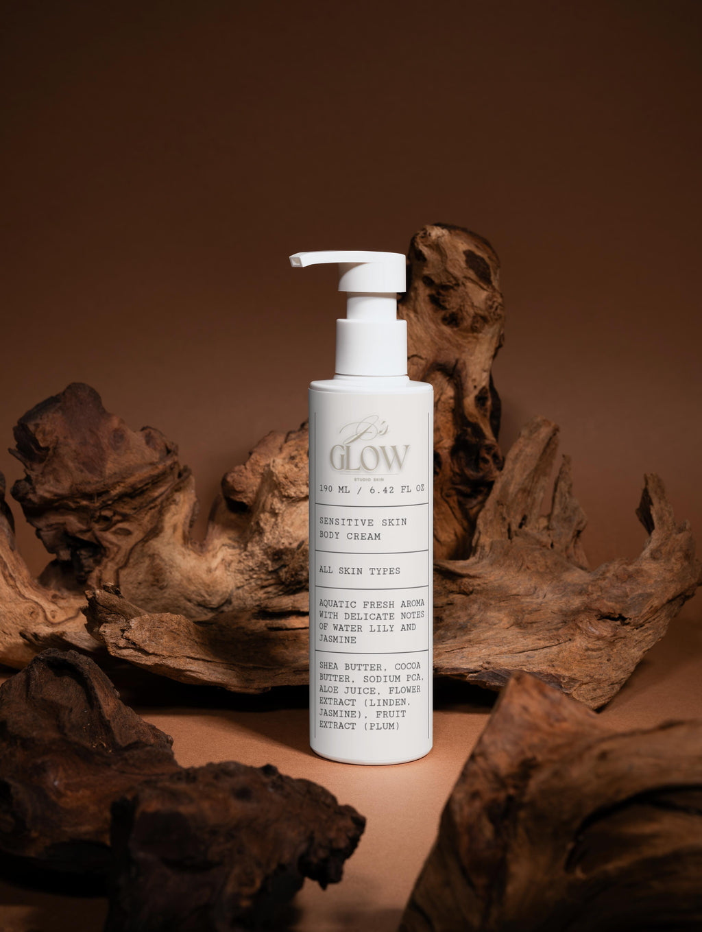 Model applying JGSS Sensitive Skin Body Cream, demonstrating soothing care for sensitive and dehydrated skin