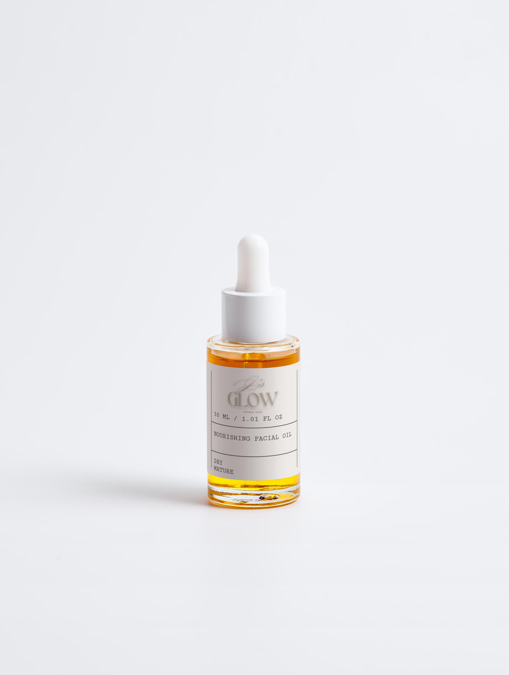 Close-up of golden facial oil texture, rich and hydrating for delicate skin