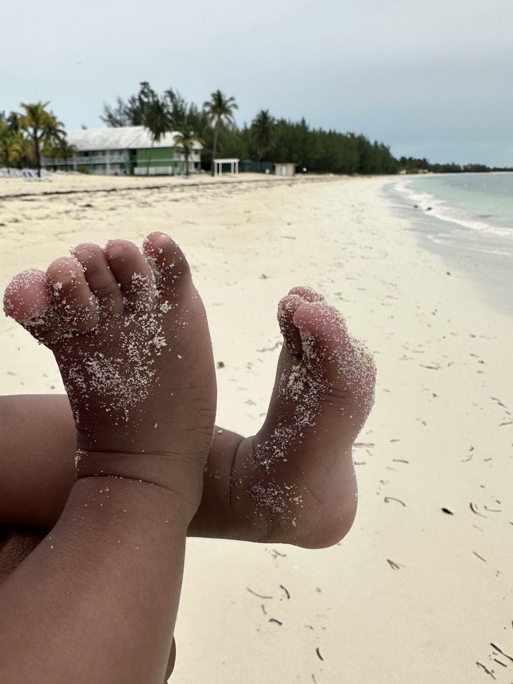 Baby body lotion displayed with soft baby feet to highlight gentle, nourishing skincare for infants.