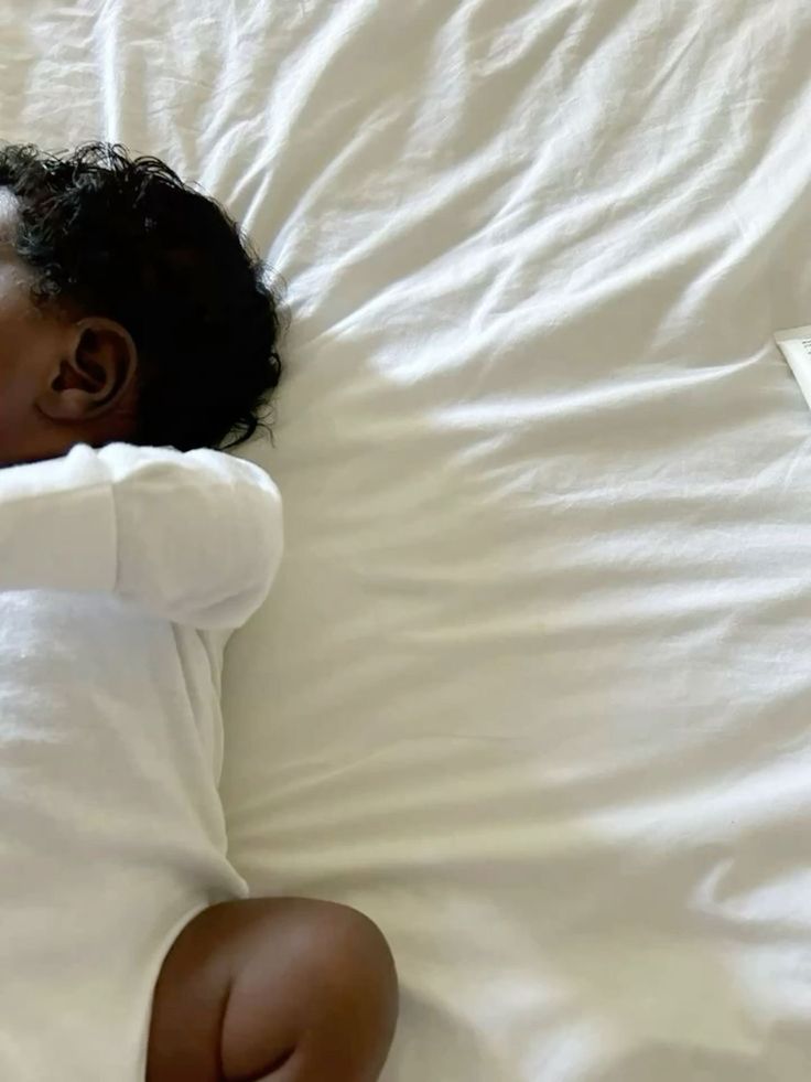 Baby body lotion displayed with soft baby feet to highlight gentle, nourishing skincare for infants.